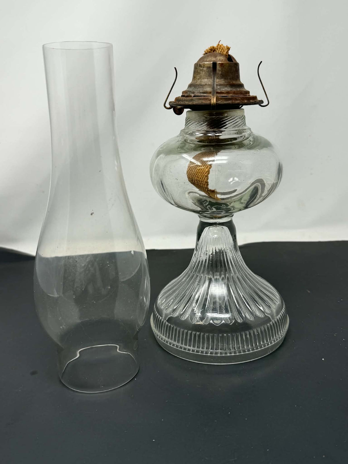 Vintage glass oil lamp front view with chimney